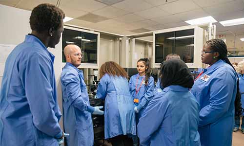 Students at Summer Research Day used microscopes 