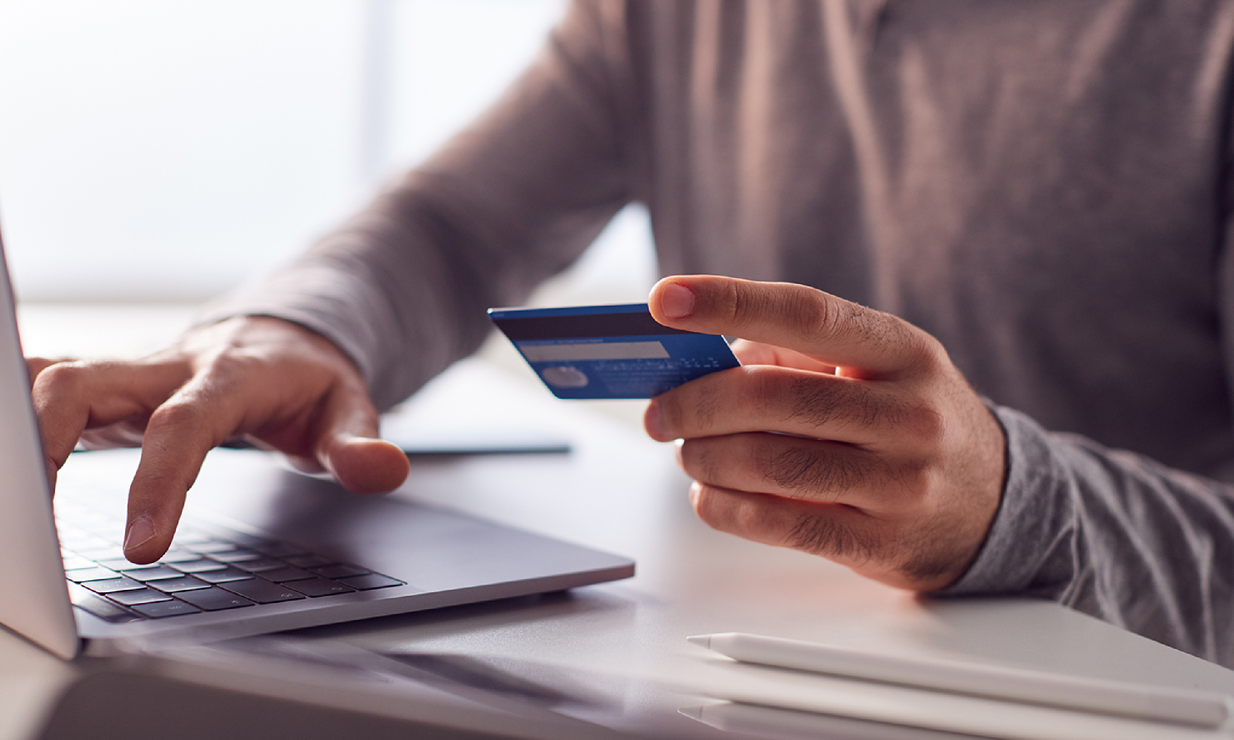 A person entering credit card information online