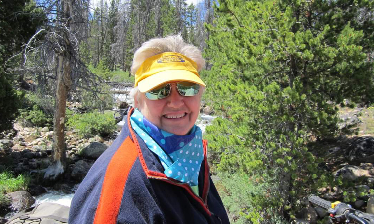 Lisa Skodack Jones smiles at the camera in Idaho’s Sawtooth Mountains.