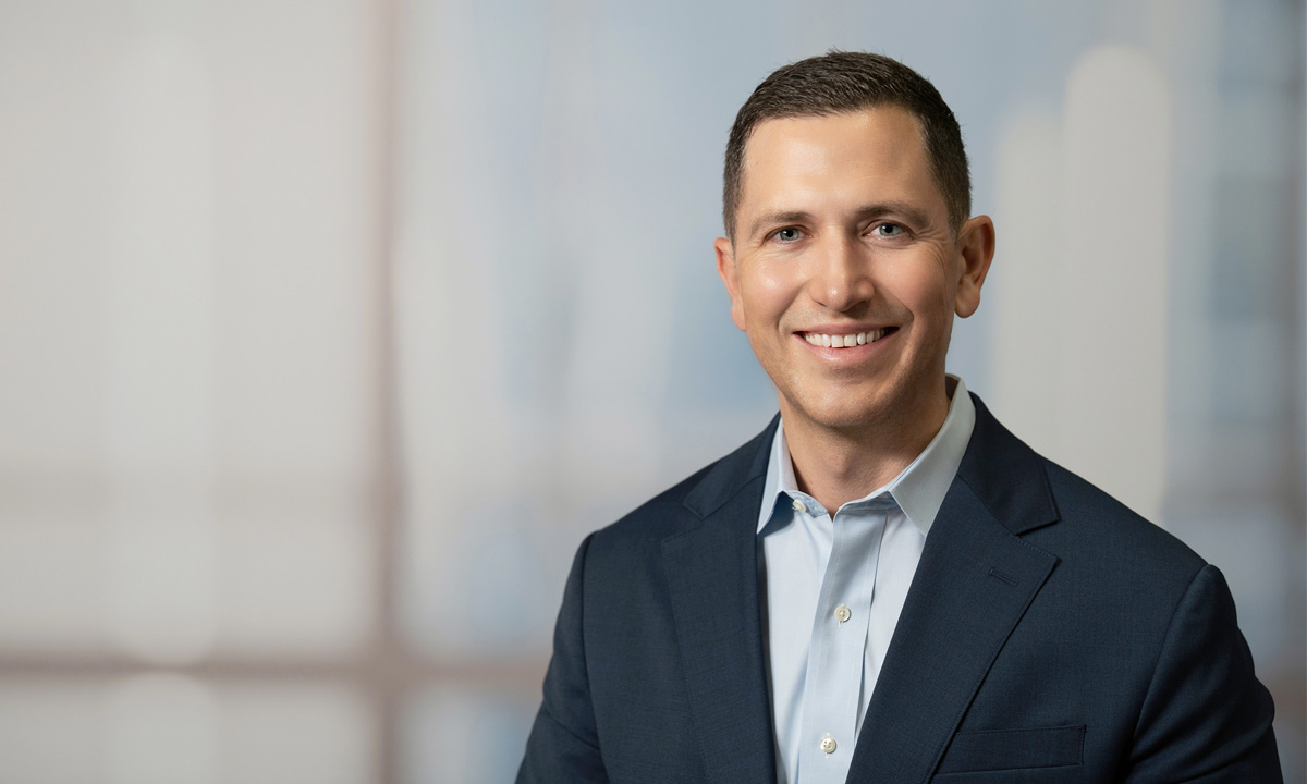 Ryan Metcalf smiles at the camera.