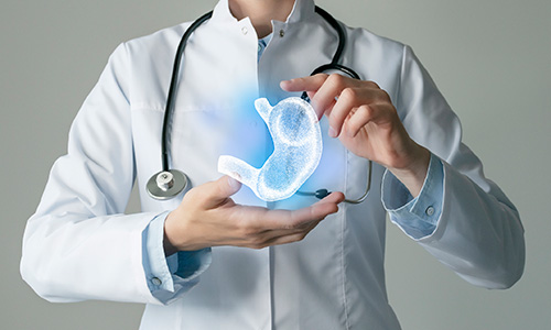 photo illustration of a clinician holding a floating stomach