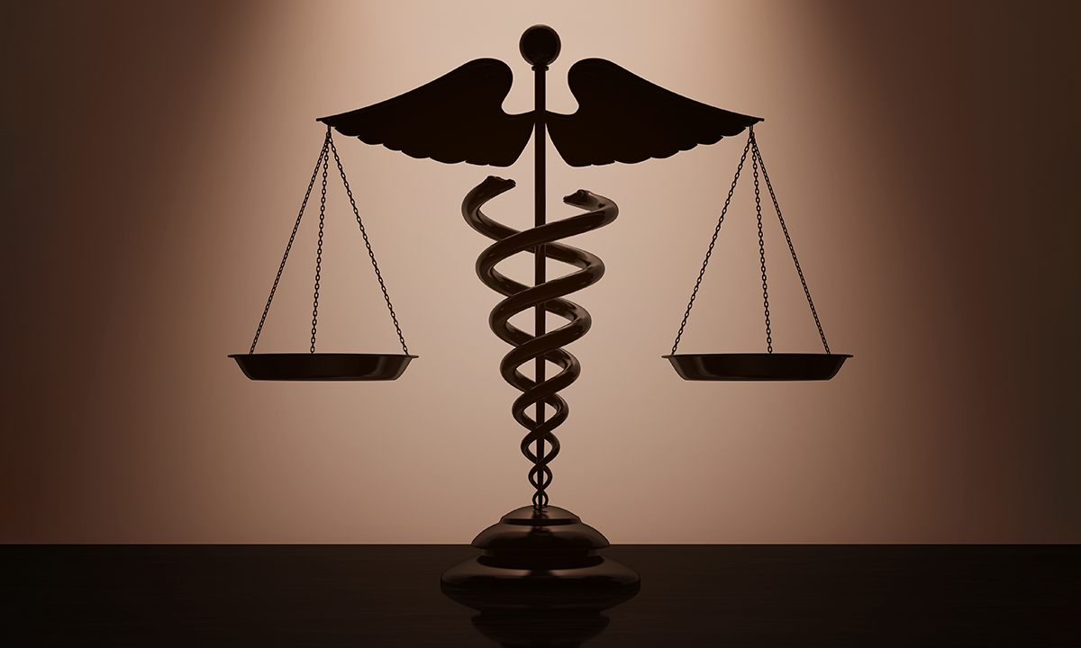 photo illustration of Caduceus and scales