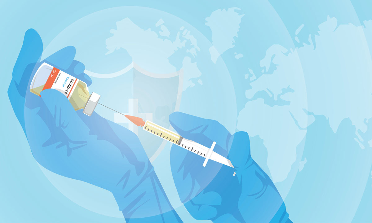 Using a syringe to pull liquid out of a vial labeled COVID-19