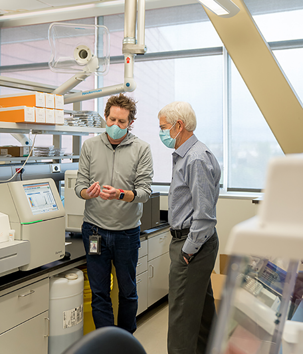 David Hillyard, MD, medical director of ARUP’s Molecular Infectious Diseases Laboratory, and Kelly Oakeson, PhD, Utah Public Health Laboratory chief scientist of bioinformatics and next generation sequencing