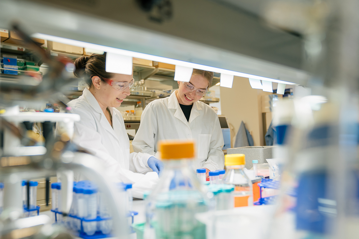 University of Utah graduate students Morgan Marsh and Annette Gerlund working in a lab