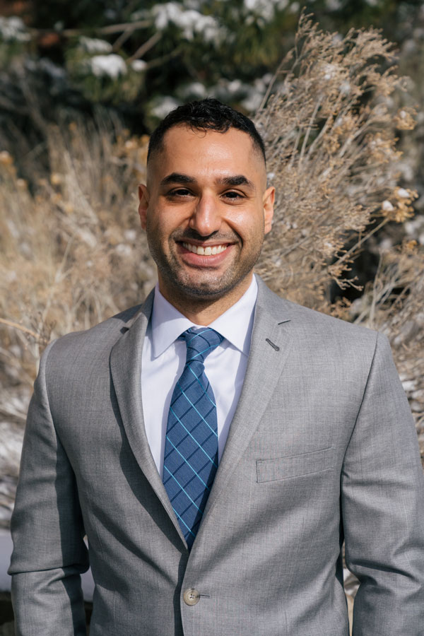 Close up of Waseem Anani smiling outdoors