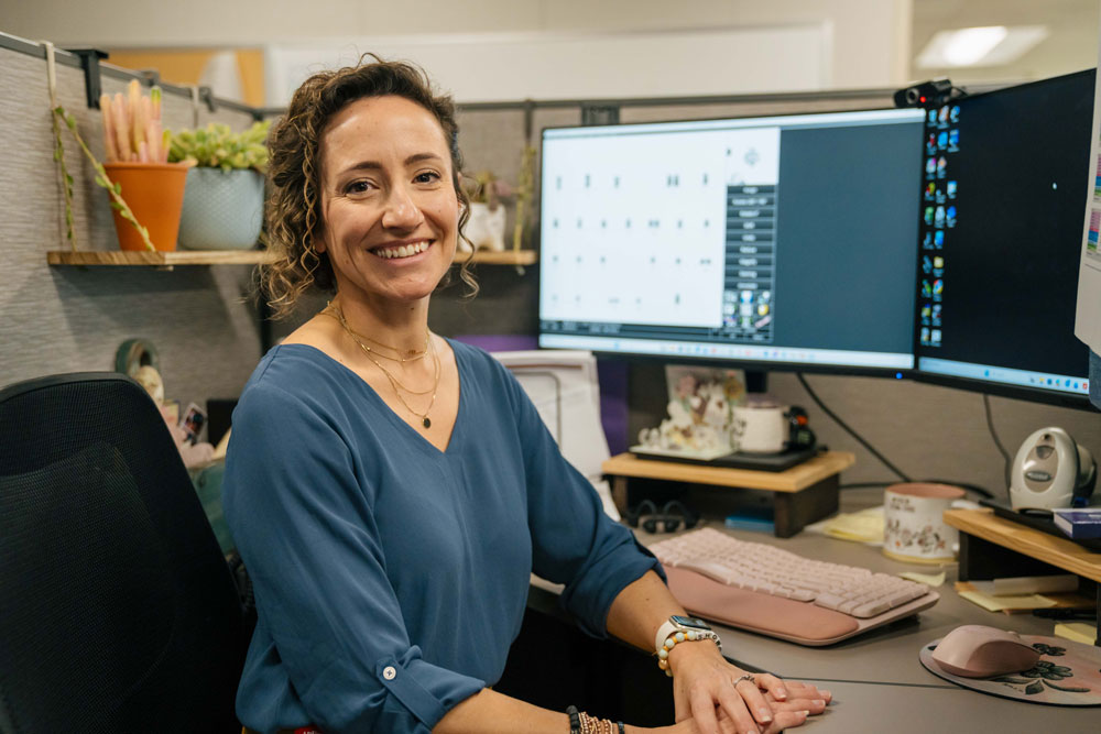 Monica Theriot at her desk
