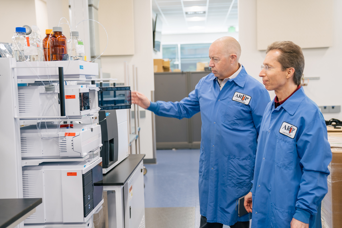 Gordon Nelson and Warren Hunt stand in the new Mass Spectrometry Laboratory